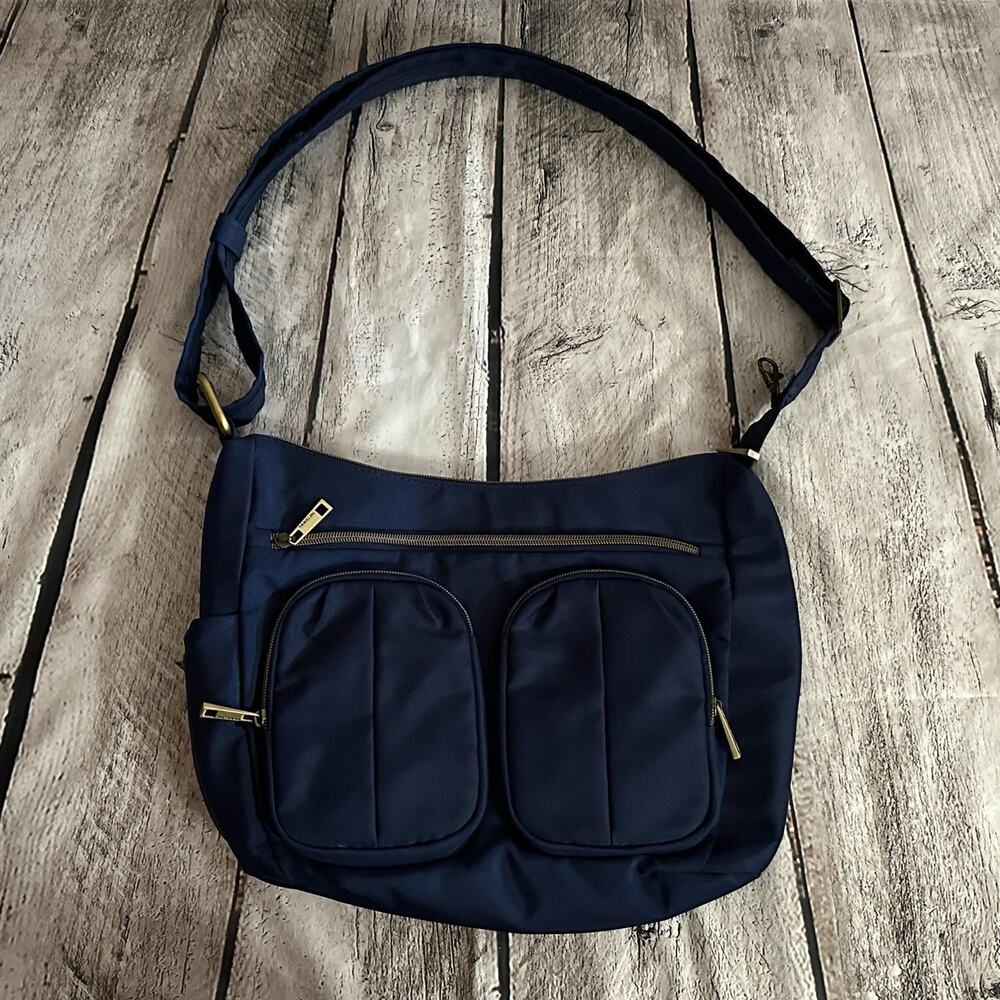 C22 Travelon Blue Crossbody Bag with RFID Shielded Pocket